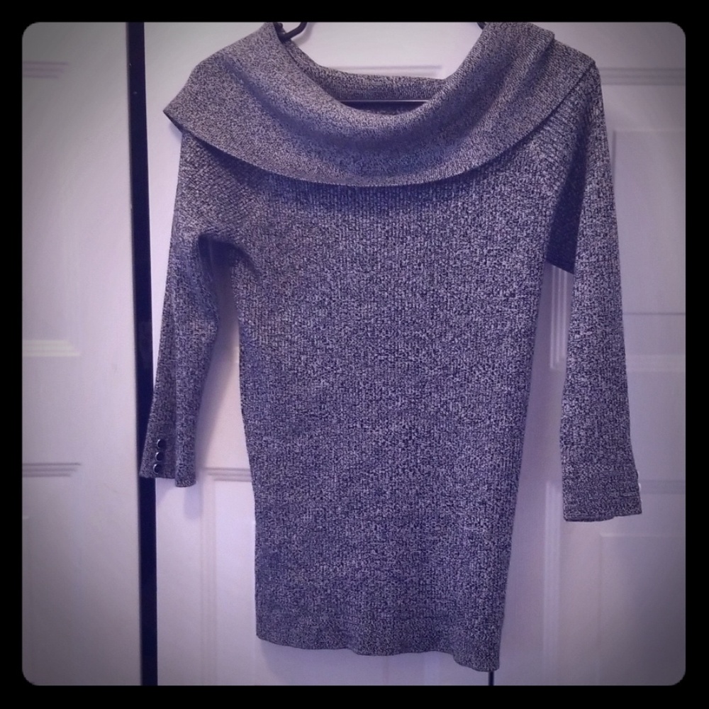 Off shoulder top with silver buttons on the arms